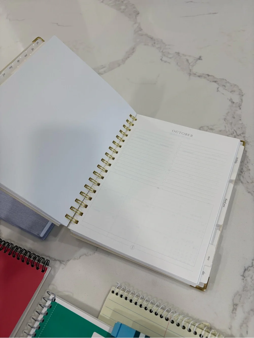 Assorted Notebooks & Planners - Mix of Colors (Blue, Red, Cream, Green)